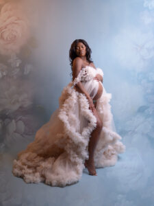 Pregnant woman wearing a fancy gown during a maternity photoshoot in Calgary