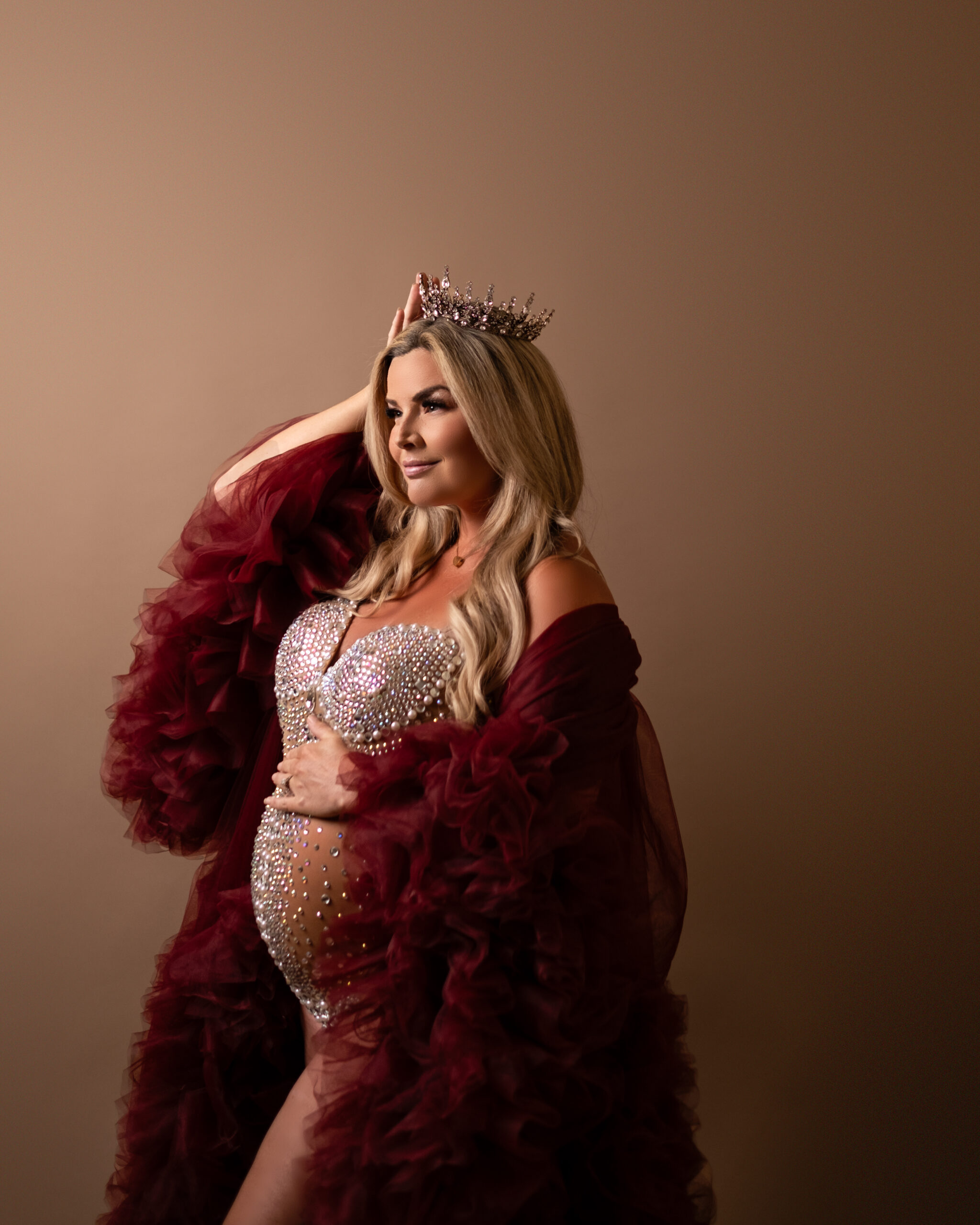 Calgary Maternity Fine Art Photoshoot - mom wearing crown, cape, bodysuit